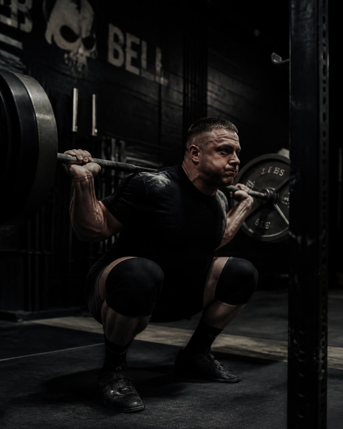Athlete at the bottom of a heavy back squat